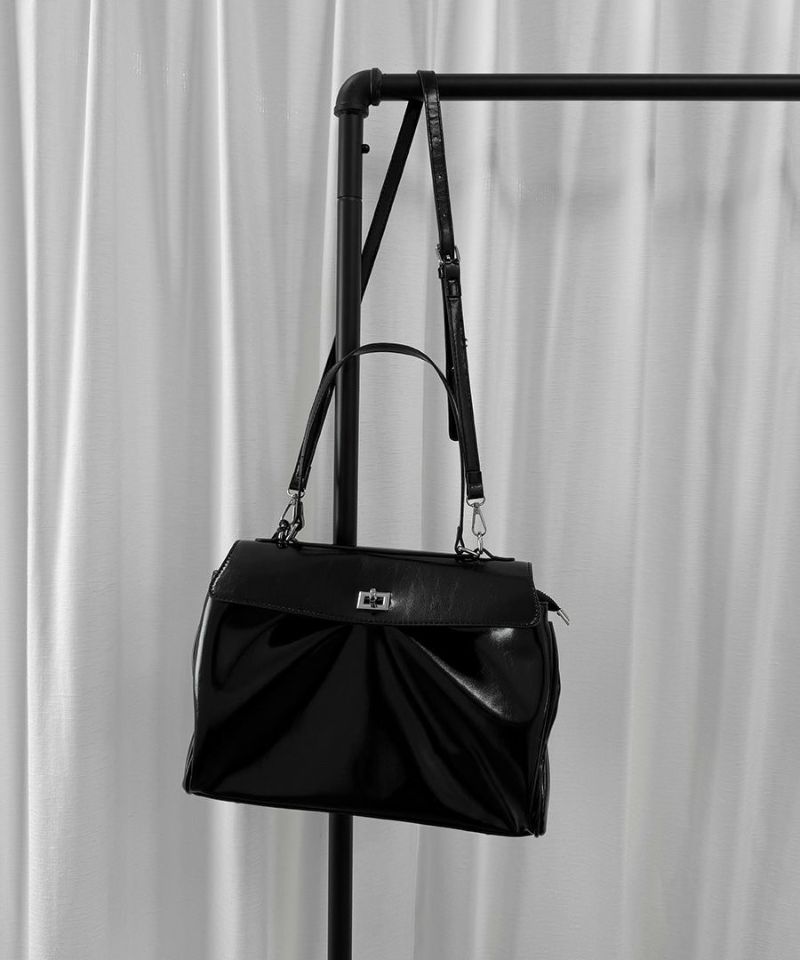 Double buckle shoulder bag