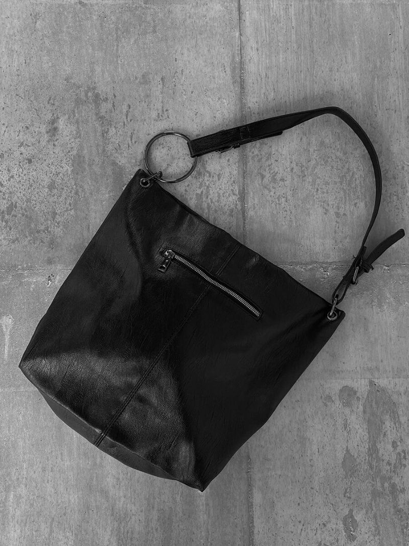 Ring design faux leather bag